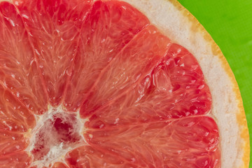 Pile of fresh grapefruits on display at street market