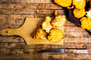 Golden chanterelle mushrooms on a table