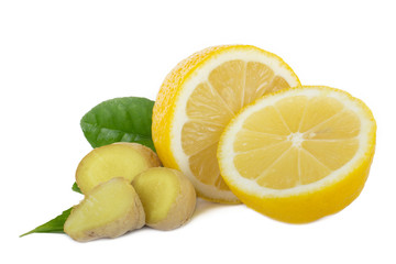 slices of ginger and lemon with leaves isolated on white background