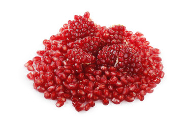 heap of red pomegranate isolated on white background