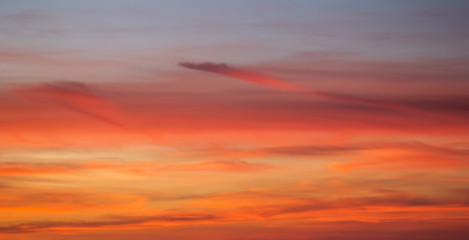 Sunset orange blue pink sky with clouds 