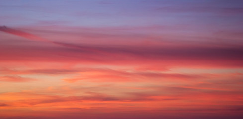 Sunset orange blue pink sky with clouds 