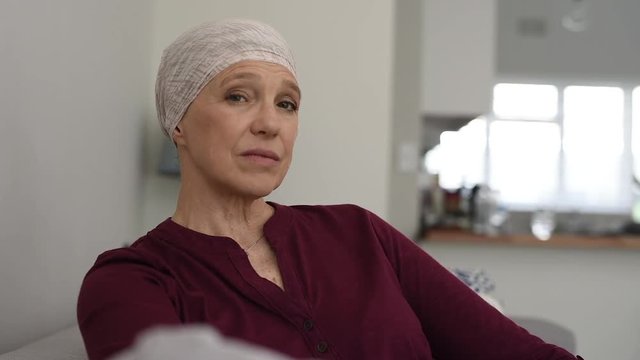 Mature sad woman suffering from cancer