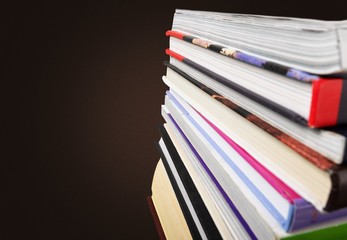 Ancient books in a row on wooden