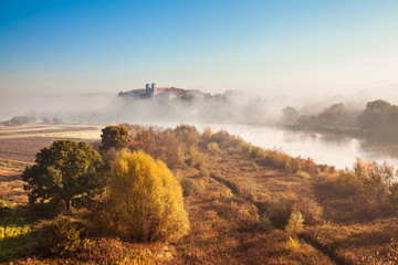 Abbey Tyniec surrounded by meandering Vistula river in colorful autumn scenery. Worth seeing nature reserve of Krakow © fotolupa
