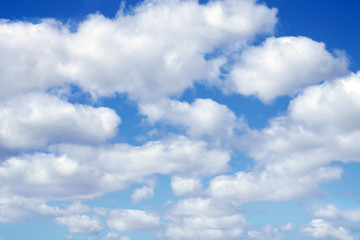 Naklejka na ściany i meble White clouds on the blue sky bankground