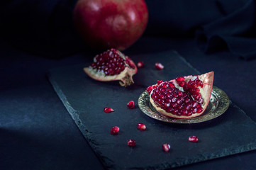 View of pomegranate on dark background