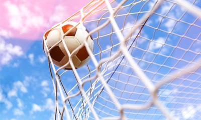 Soccer ball in goal, sport concept