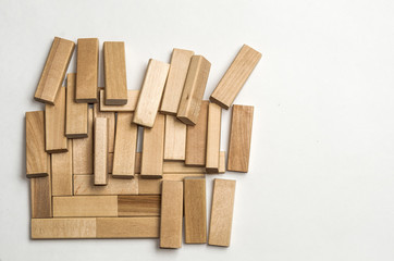 A set of bars of children's designer scattered on the plane, in a mess, ready for use, creative play, copy space.