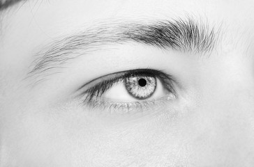 A beautiful insightful look man's eye. Close up shot.