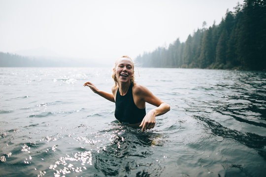 Smiling woman in water