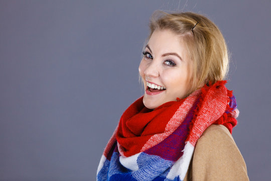 Woman Wearing Light Brown Coat And Colorful Scarf