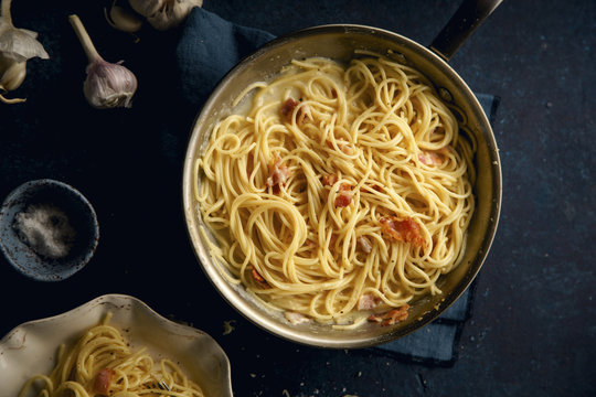 Carbonara with bacon in pan
