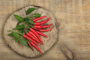 heap of red chili pepper on wooden background