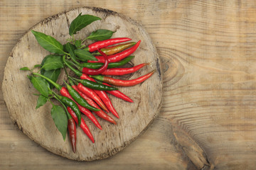 heap of red chili pepper on wooden background