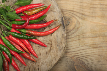 heap of red chili pepper on wooden background