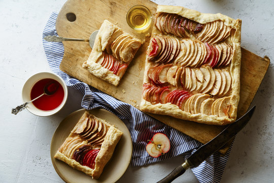 Apple galette with tahini frangipane and hibiscus glaze. Fall comfort food concept