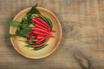 heap of red chili pepper on wooden background