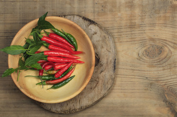heap of red chili pepper on wooden background