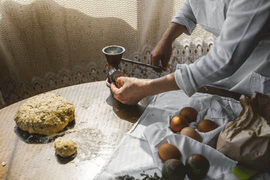 Woman Preparing Homemade Dough in the Kitchen and using a mincing machine. Preparation Raw Dough for Baking