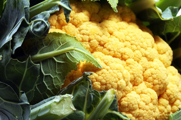Colorful cauliflower cabbages on table. Healthy food.