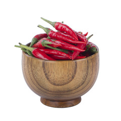 heap of red chili pepper in wooden cup  isolated on white background