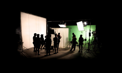 Silhouette images of video production behind the scenes or b-roll or making of TV commercial movie...