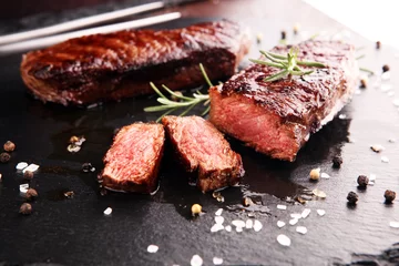 Foto auf Acrylglas Barbecue Rib Eye Steak oder Rumpsteak - Dry Aged Wagyu Entrecote Steak © beats_