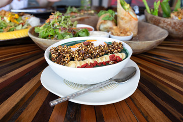 Vegetable pudding bowl vegan dessert with raspberry and banana clean eating concept.