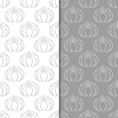 Halloween pumpkin patterns. Gray seamless backgrounds