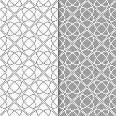 Gray and white geometric ornaments. Set of seamless patterns