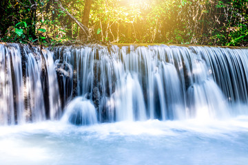 Landscape photo, Huay Mae Kamin Waterfall,Amazing waterfall in wonderful autumn forest, beautiful waterfall in rainforest at Kanchanaburi province, Thailand