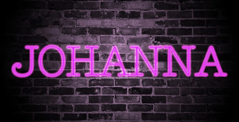 Fototapeta na wymiar first name Johanna in pink neon on brick wall