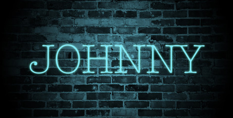 first name Johnny in blue neon on brick wall