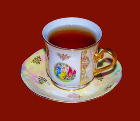 Autumn leaves of different colors, near a beautiful cup with tea, on an isolated background and on and backgrounds of different colors. 