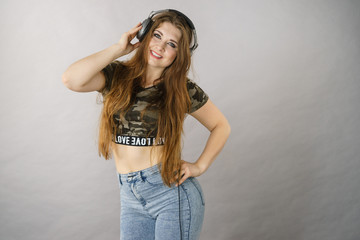 Teen women wearing headphones