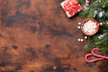 Christmas gift box, candy canes, hot chocolate with marshmallow