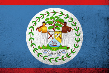 National flag of Belize with coat of arms. Grunge background