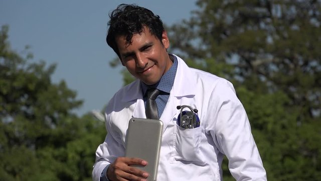 Happy Hispanic Doctor With Tablet Posing