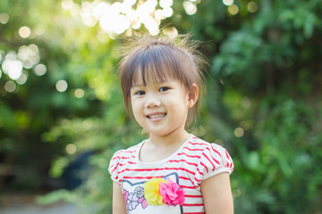 Beautiful portrait picture of an emotional face of smiling and laughing 3 year old Asian children.Healthy and happy kid.