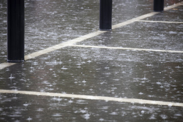 Heavy rain with localised flooding in supermarket car park