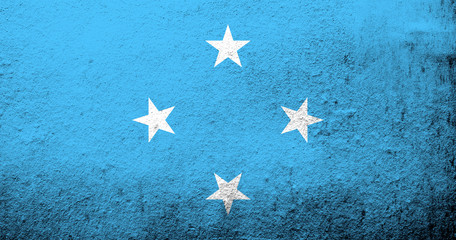 The Federated States of Micronesia national flag. Grunge background