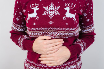 Cropped close up photo of unhappy sad upset feeling bad woman touching belly with hands isolated on...
