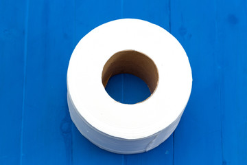 white paper roll on blue background