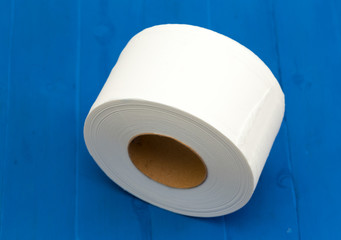 white paper roll on blue background