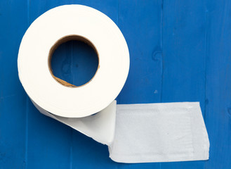 white paper roll on blue background