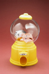 Miniature Piggybanks in Bubblegum Machine