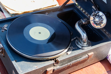 Gramophone with vinyl record close-up