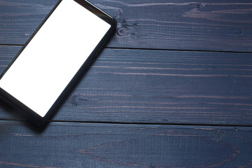 Smartphone on a dark background copy space