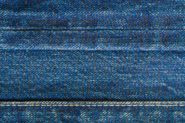Naklejka premium Close up of blue jeans, beautiful retro denim with seam, Top view.